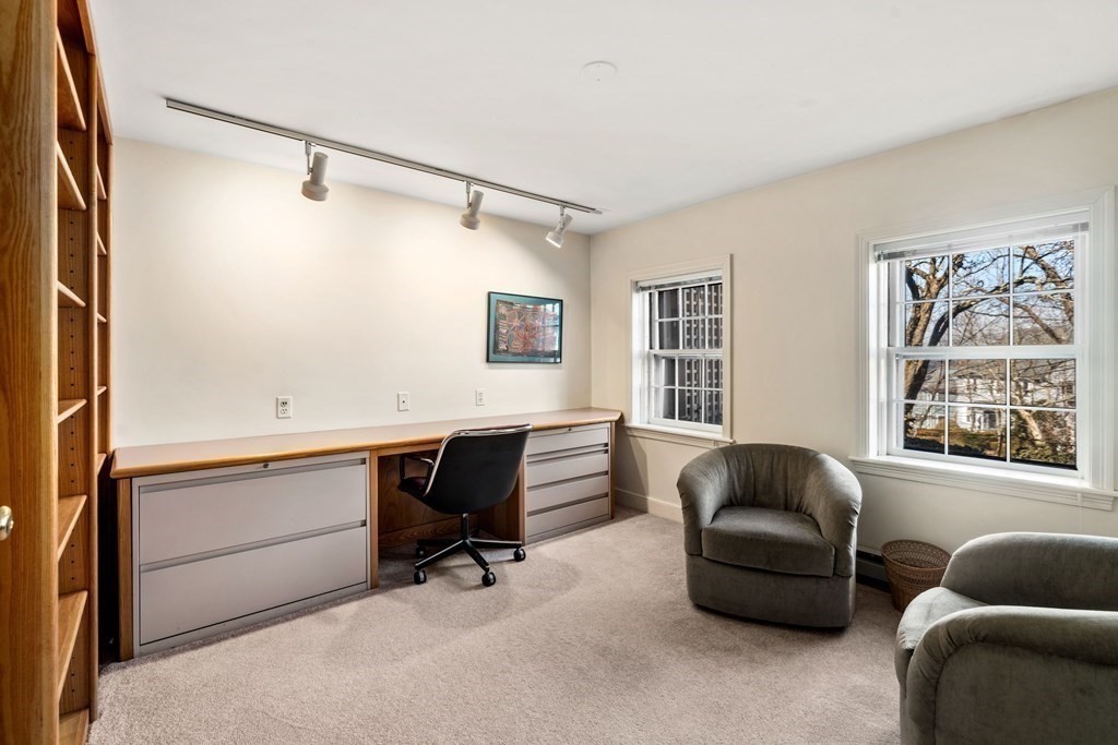 204 Lancaster Terrace Brookline, MA 02446 - Photo 23 of 32 a living room with furniture and a window