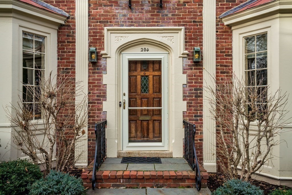 204 Lancaster Terrace Brookline, MA 02446 - Photo 25 of 32 a front view of a house with a door