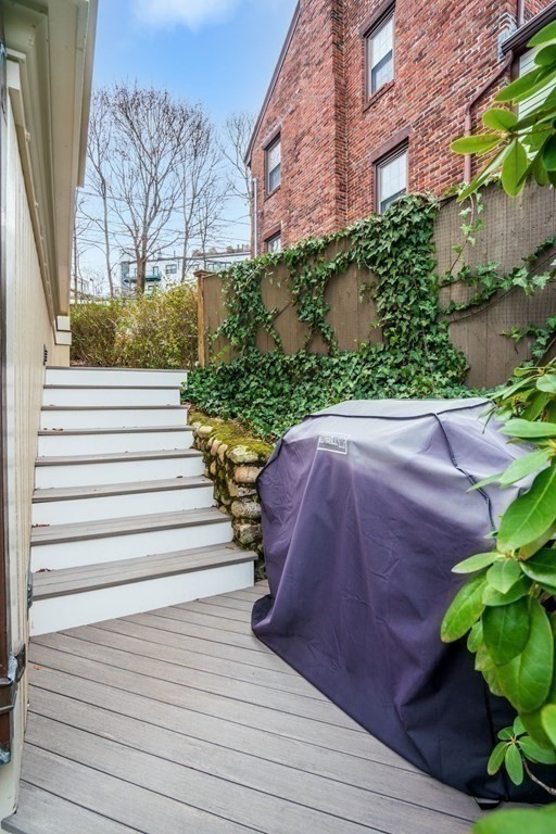 204 Lancaster Terrace Brookline, MA 02446 - Photo 29 of 32 a view of a yard in front of a house