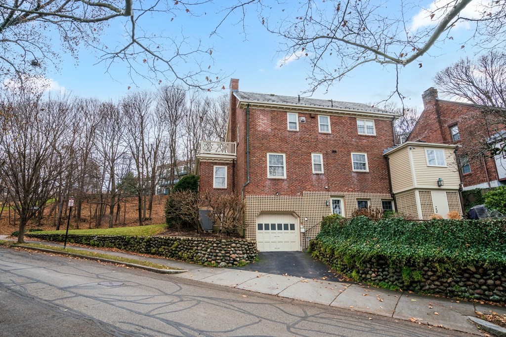 204 Lancaster Terrace Brookline, MA 02446 - Photo 32 of 32 a front view of a building with garden