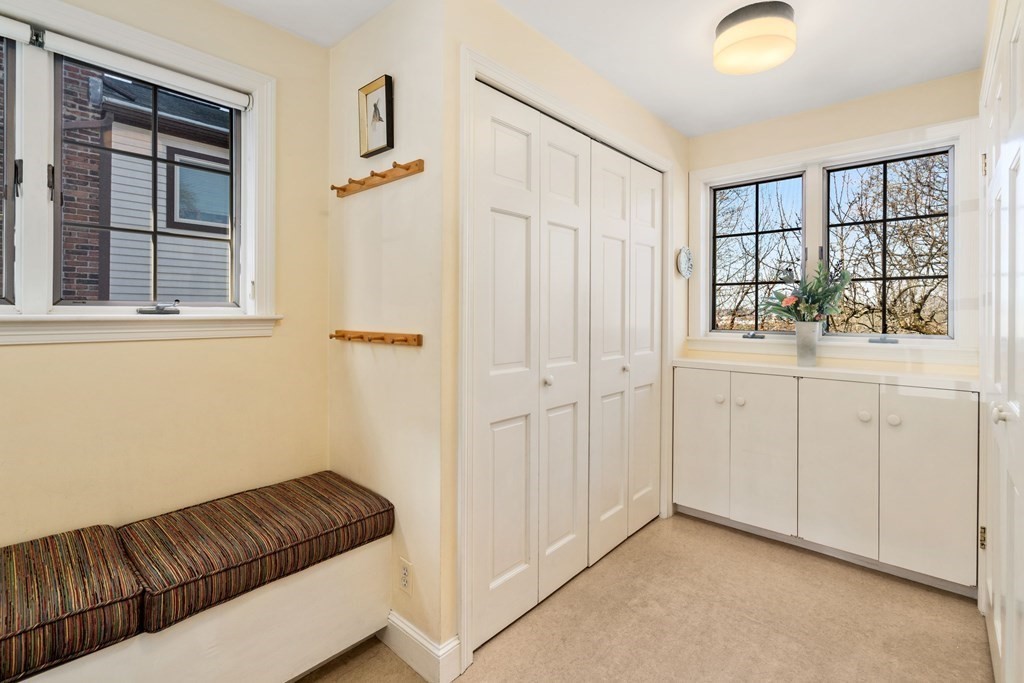 204 Lancaster Terrace Brookline, MA 02446 - Photo 7 of 32 a view of a livingroom with furniture and windows