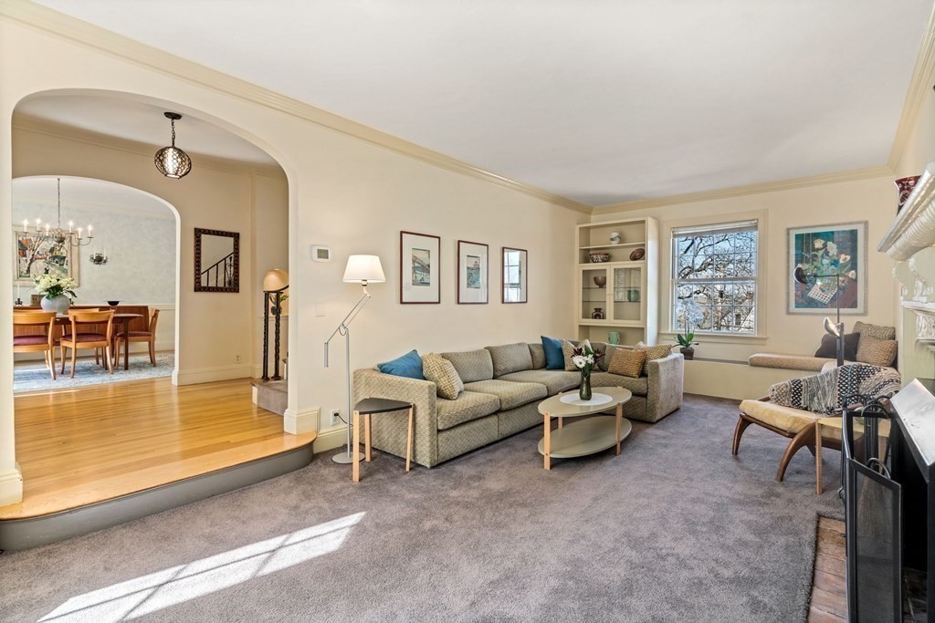 204 Lancaster Terrace Brookline, MA 02446 - Photo 10 of 32 a living room with furniture and a large window