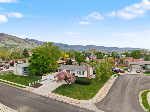523 Mountain View Road Centerville, UT 84014 - Photo 26 of 33 Aerial view of residential area with a mountainous background