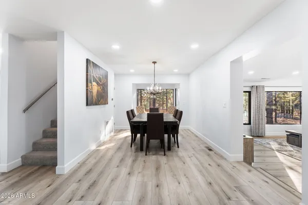 a kitchen with stainless steel appliances granite countertop a stove and a sink