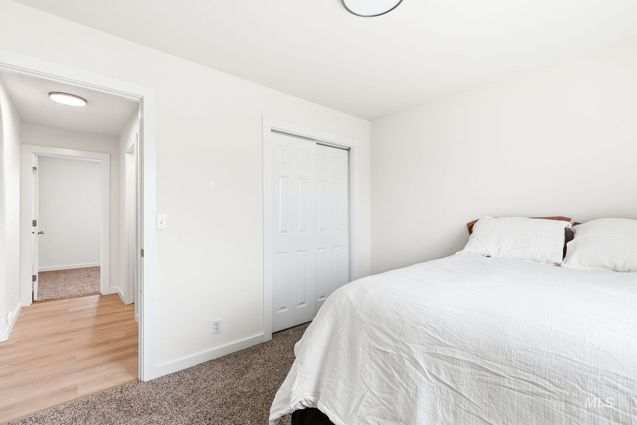 696 West Rams Hill Street Kuna, ID 83634 - Photo 32 of 46 Bedroom featuring carpet flooring and a closet