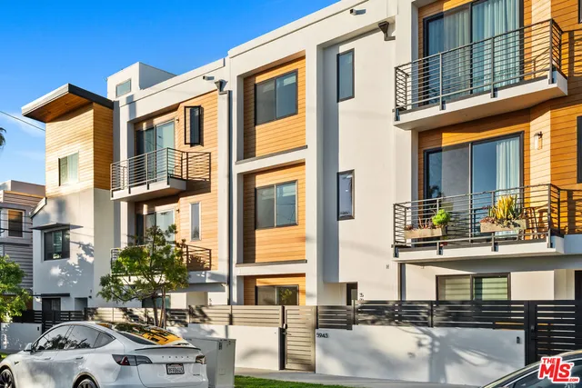 a front view of a building with street view