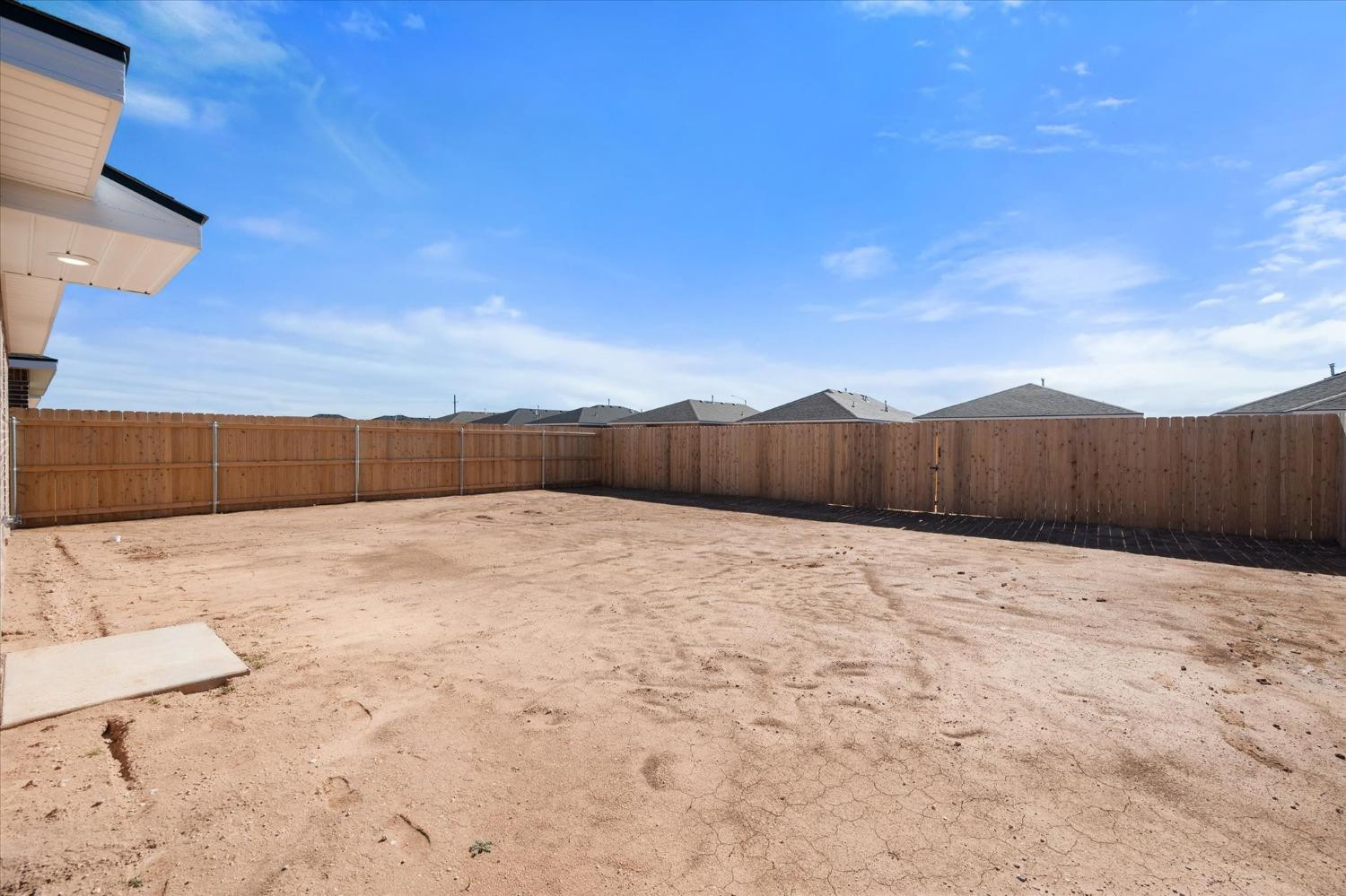 5519 Queens Street Lubbock, TX 79416 - Photo 19 of 21 a view of an empty room with wooden fence