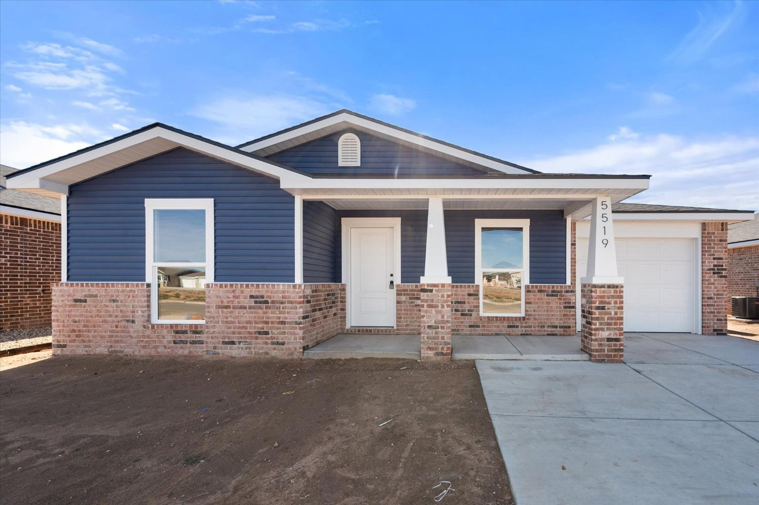 5519 Queens Street Lubbock, TX 79416 - Photo 2 of 21 a front view of house with yard