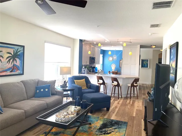 a bathroom with a double vanity sink a mirror and a shower