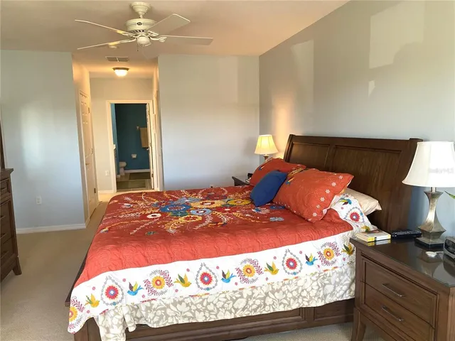 an aerial view of house with yard swimming pool and outdoor seating