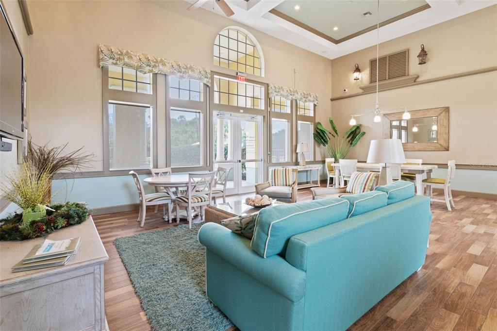 700 Canopy Walk Lane, Unit 735 Palm Coast, FL 32137 - Photo 73 of 77 a living room with furniture and a large window