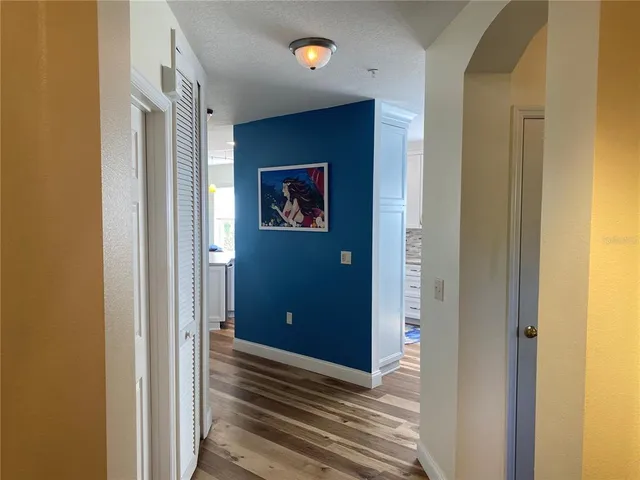 a kitchen with a sink stove and microwave