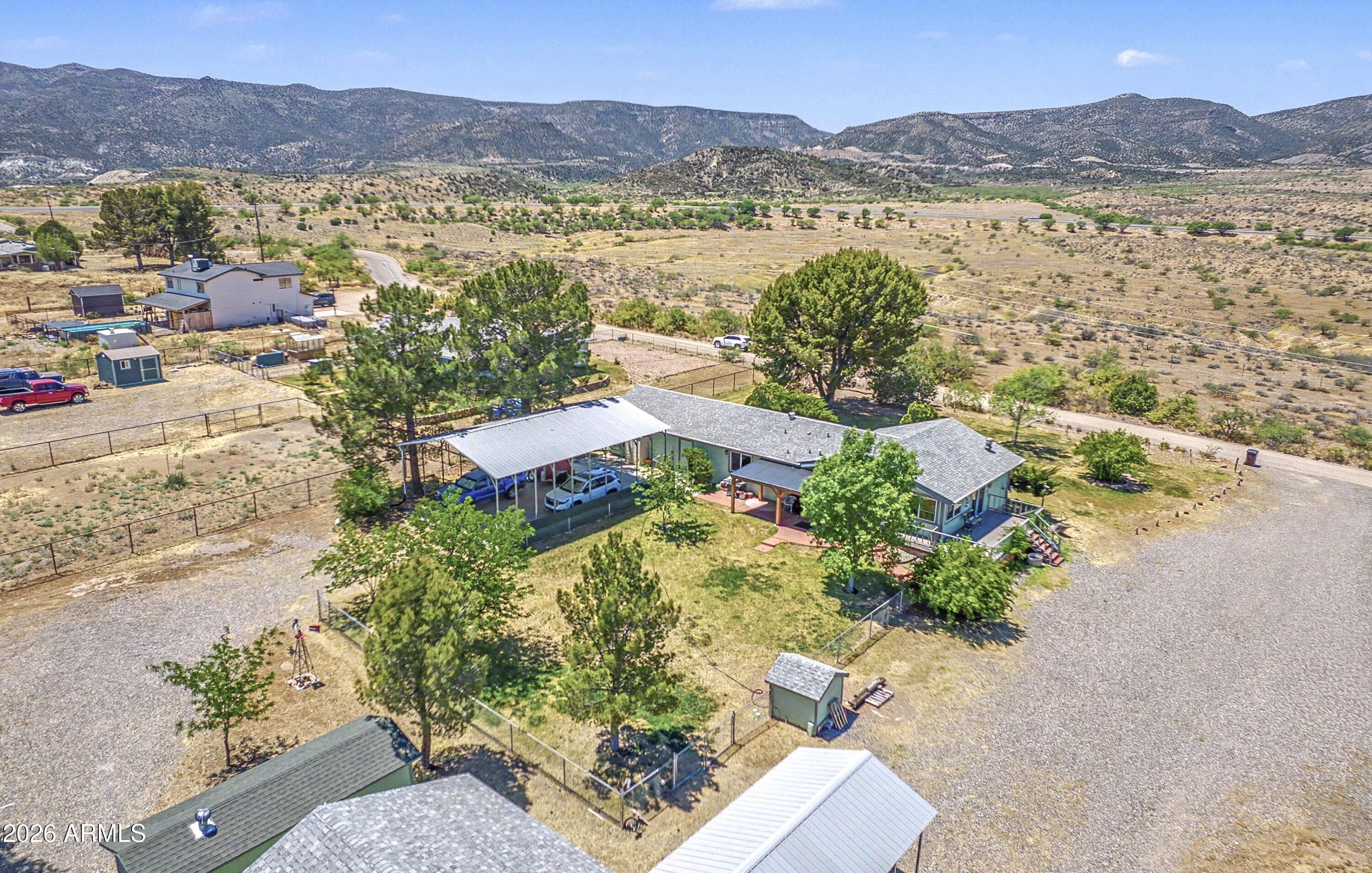 633 Oasis Road Camp Verde, AZ 86322 - Photo 11 of 50 an aerial view of residential house with outdoor space and mountain view