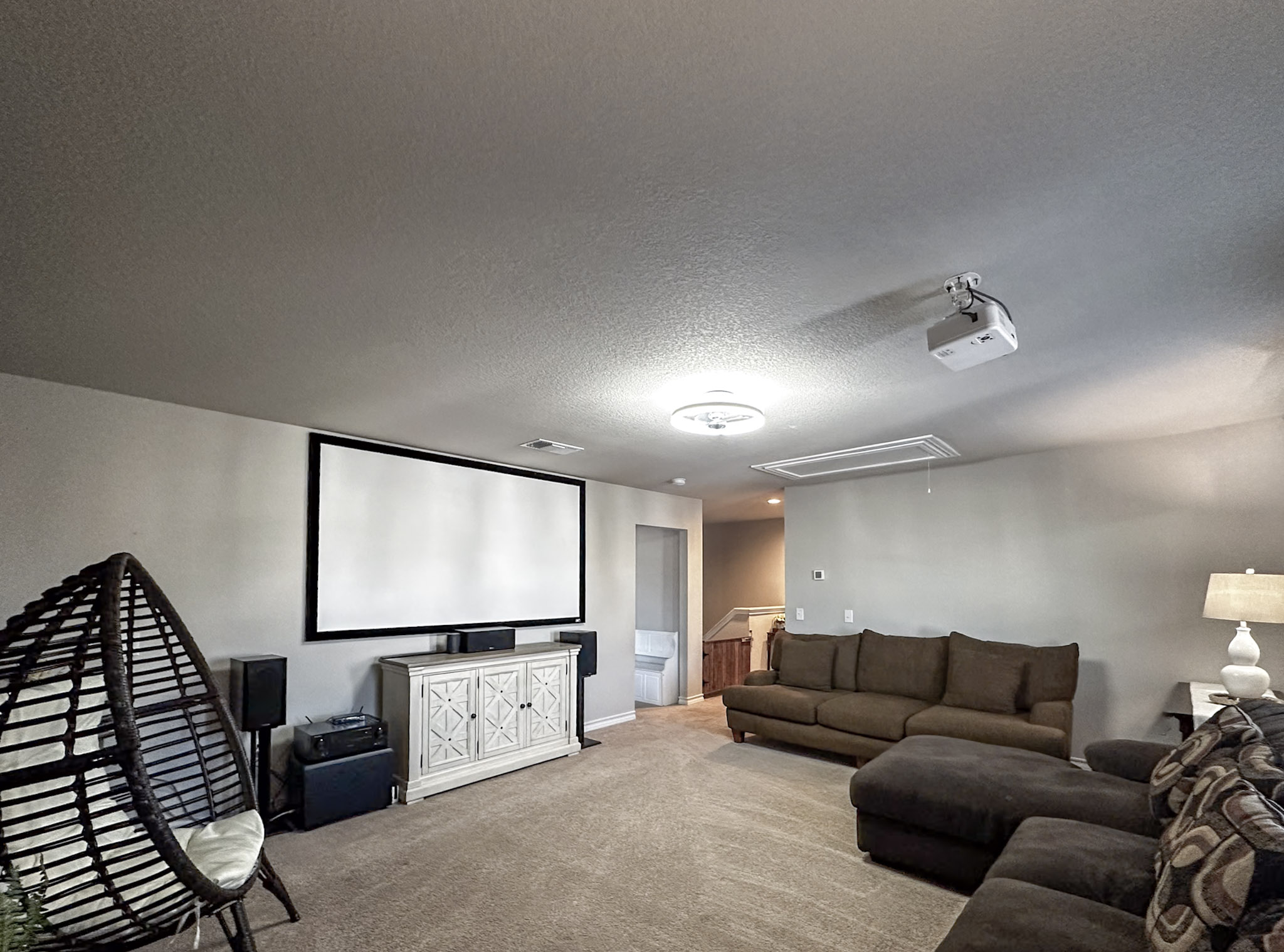 11005 Players Path Austin, TX 78747 - Photo 12 of 40 Home theater room featuring a textured ceiling and carpet floors