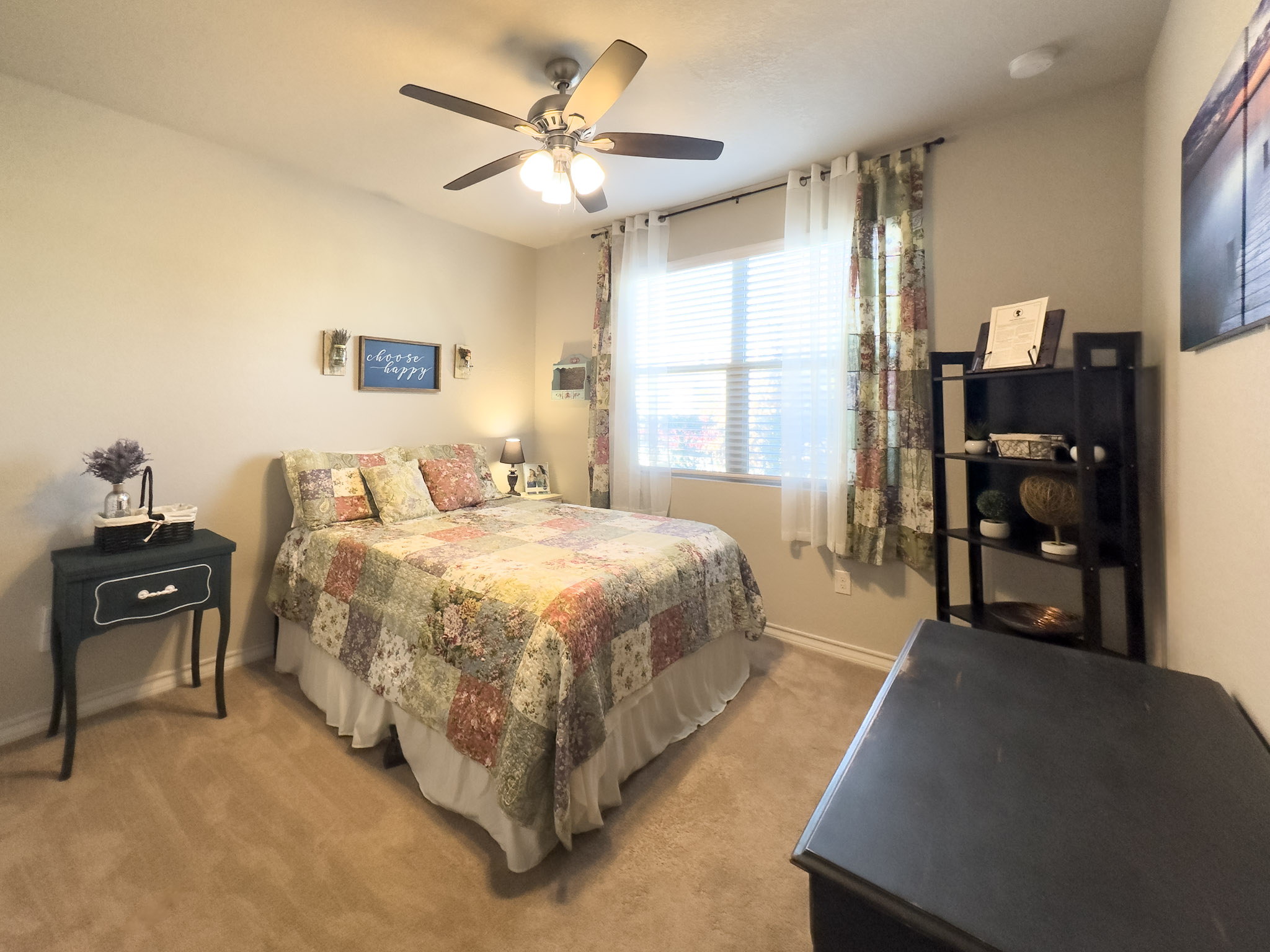 11005 Players Path Austin, TX 78747 - Photo 18 of 40 Bedroom featuring light carpet and a ceiling fan