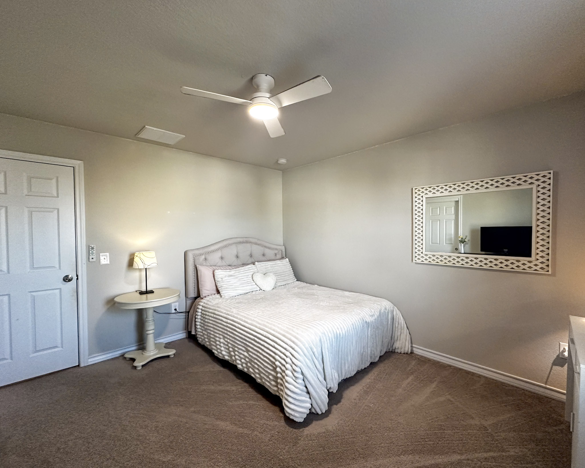 11005 Players Path Austin, TX 78747 - Photo 27 of 40 Carpeted bedroom with baseboards and a ceiling fan