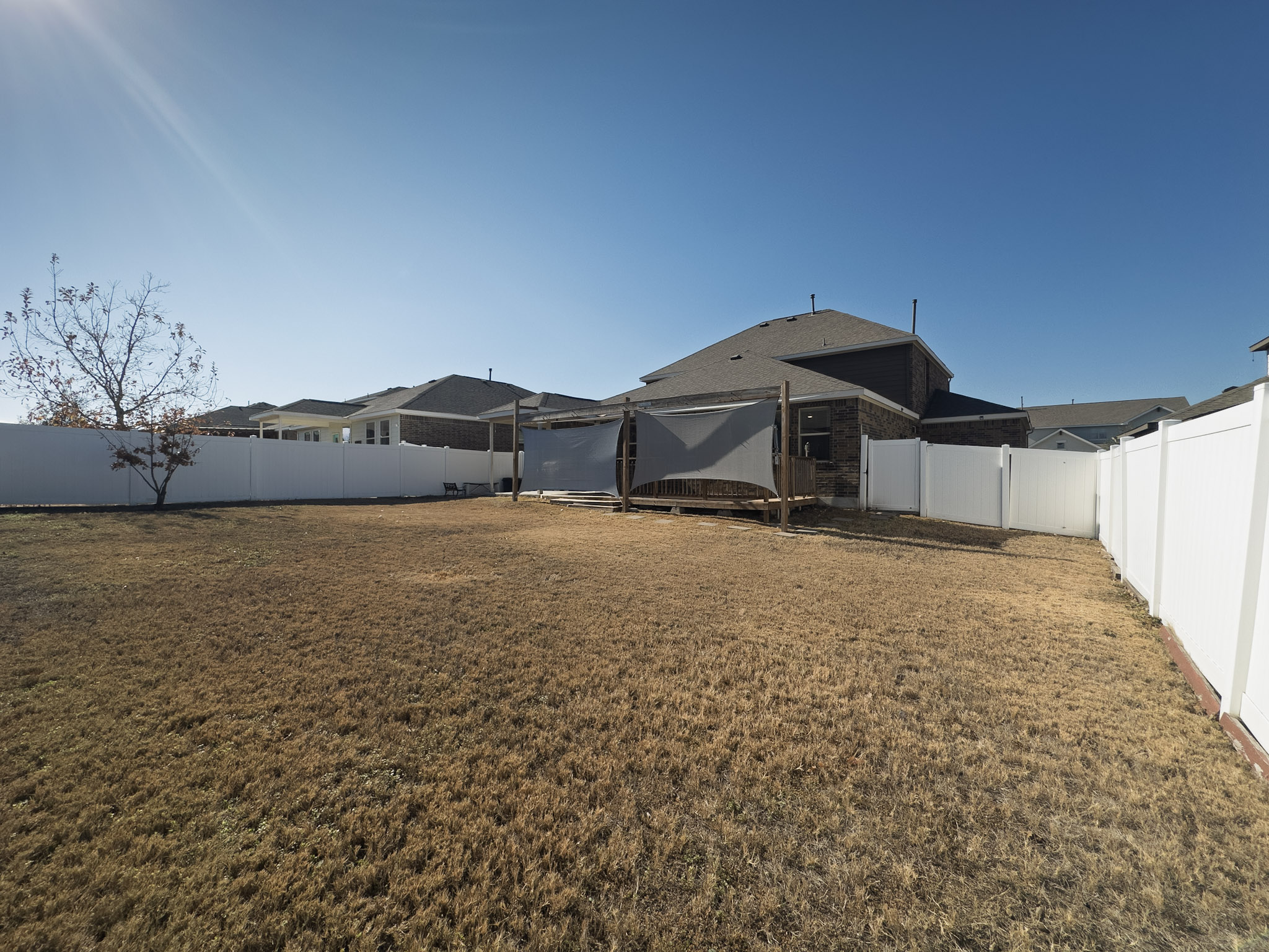 11005 Players Path Austin, TX 78747 - Photo 36 of 40 View of fenced backyard