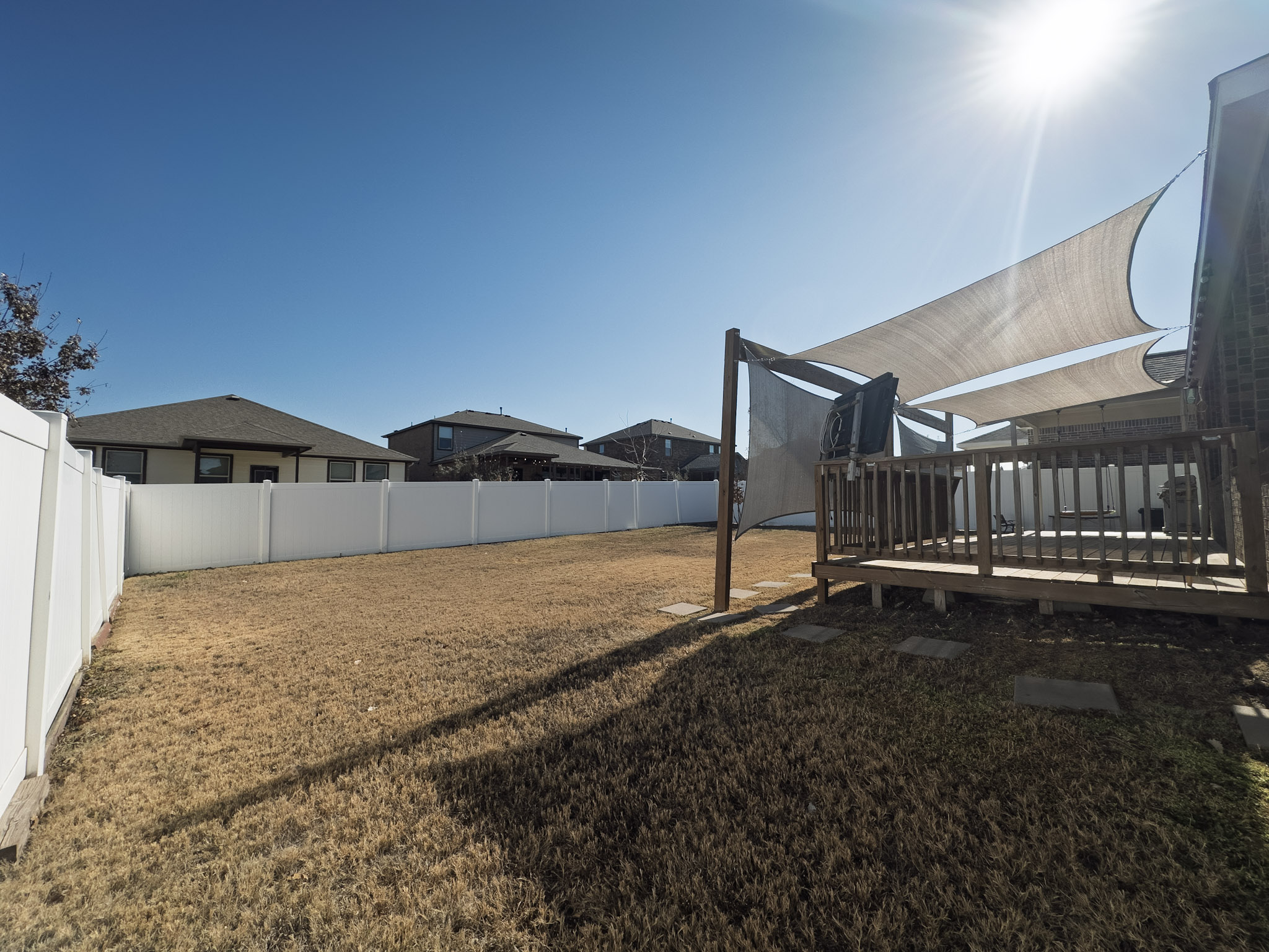 11005 Players Path Austin, TX 78747 - Photo 37 of 40 Fenced backyard featuring a deck