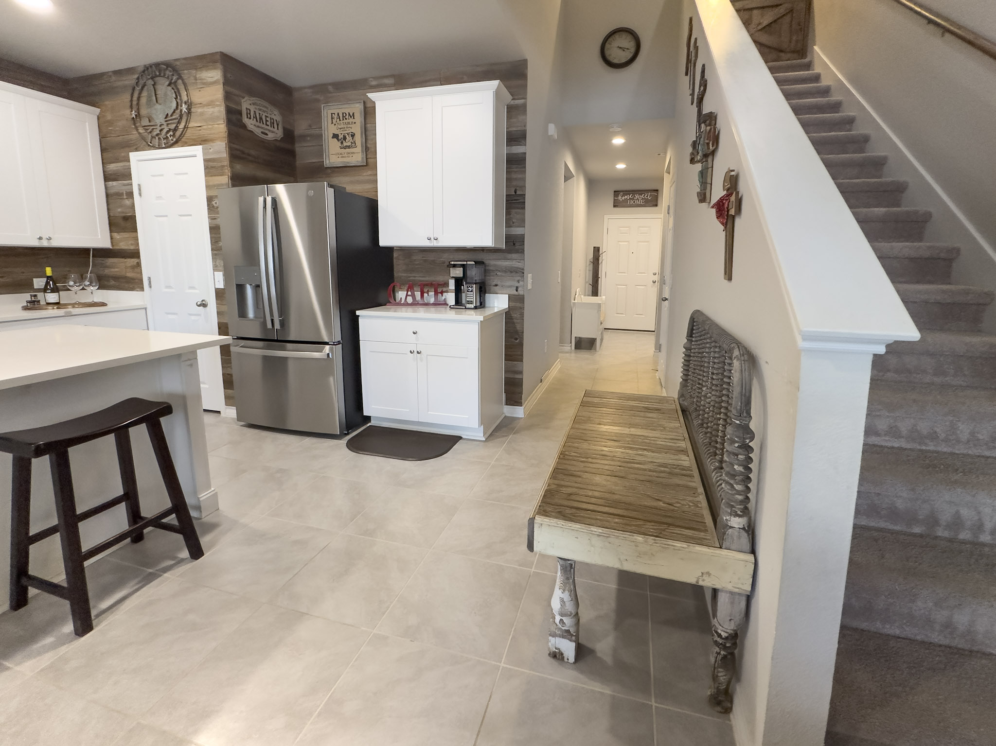 11005 Players Path Austin, TX 78747 - Photo 6 of 40 Kitchen featuring light countertops, white cabinetry, stainless steel fridge, recessed lighting, and decorative backsplash