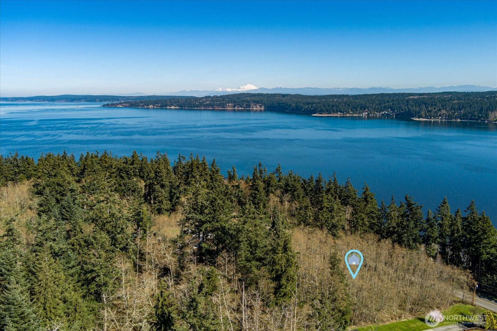 0 South Honeymoon Bay Road Greenbank, WA 98253 - Photo 4 of 12 a view of a lake with a yard