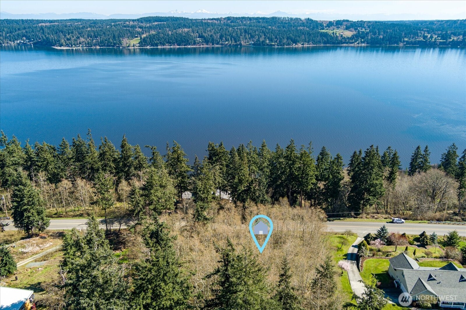 0 South Honeymoon Bay Road Greenbank, WA 98253 - Photo 5 of 12 a view of a lake with houses