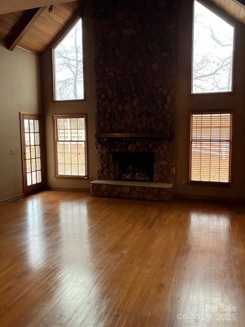4462-1 Hoover Road Lawndale, NC 28090 - Photo 17 of 38 an empty room with wooden floor fireplace and windows