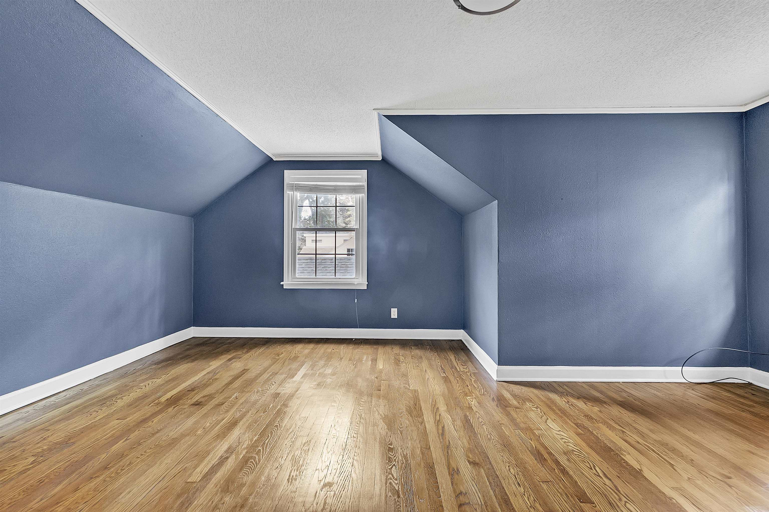 3321 Lakeview Road Memphis, TN 38116 - Photo 14 of 30 a view of empty room with wooden floor and fan