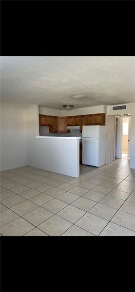 4670 Northeast 5th Avenue, Unit 9 Boca Raton, FL 33431 - Photo 6 of 8 a view of a room with a sink
