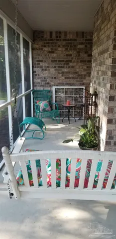 a room with furniture and a window