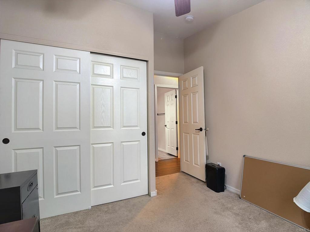 9395 Harritt Road, Unit 215 Lakeside, CA 92040 - Photo 22 of 27 an empty room with windows