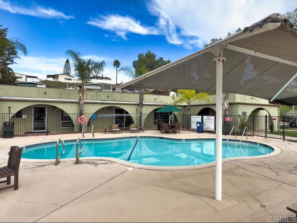 9395 Harritt Road, Unit 215 Lakeside, CA 92040 - Photo 26 of 27 a view of a street with house