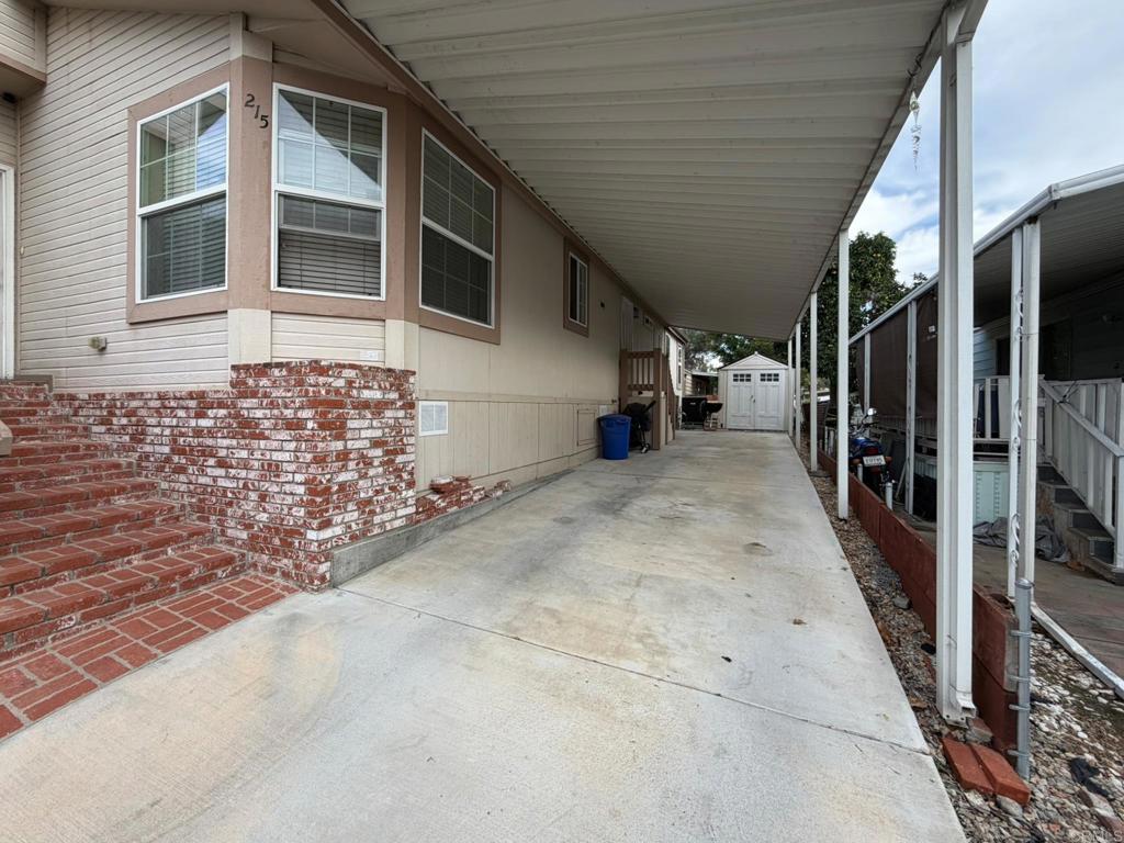 9395 Harritt Road, Unit 215 Lakeside, CA 92040 - Photo 5 of 27 a view of a house with a outdoor space