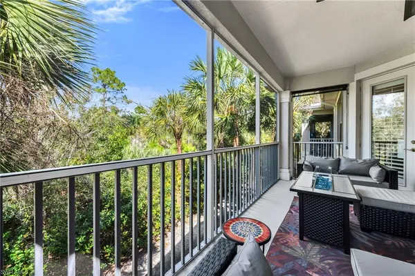 a balcony with chairs