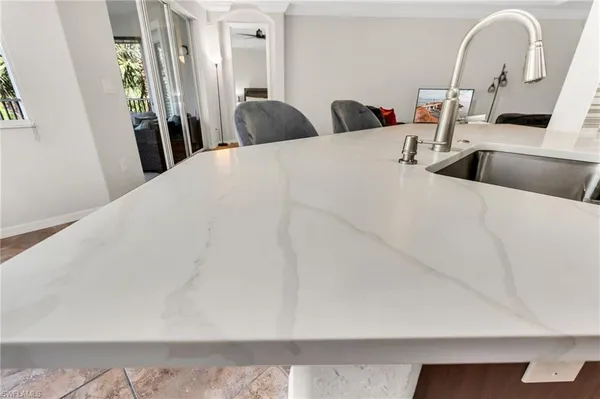 a large white bed in a white room