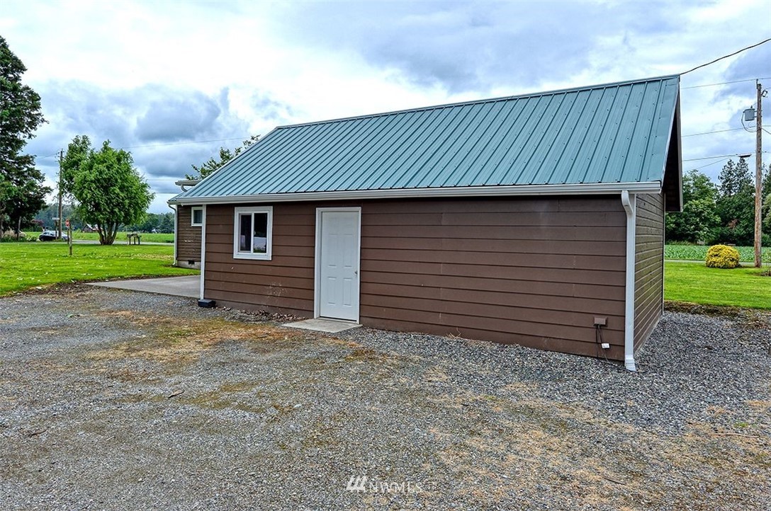 2909 Massey Road Everson, WA 98247 - Photo 18 of 27 a front view of house with a garden