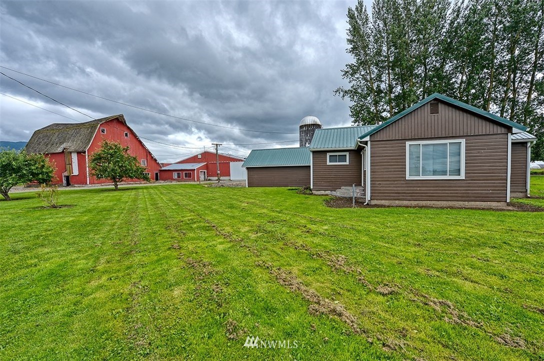 2909 Massey Road Everson, WA 98247 - Photo 23 of 27 a front view of house with yard and green space