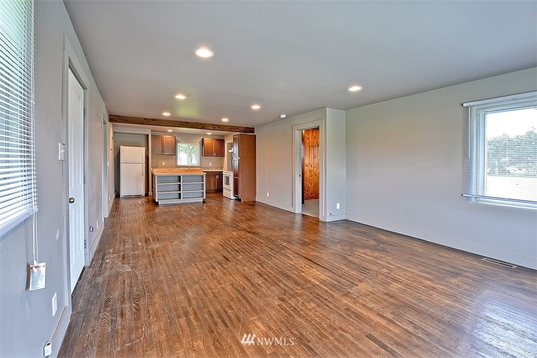 2909 Massey Road Everson, WA 98247 - Photo 8 of 27 wooden floor in an empty room with a window
