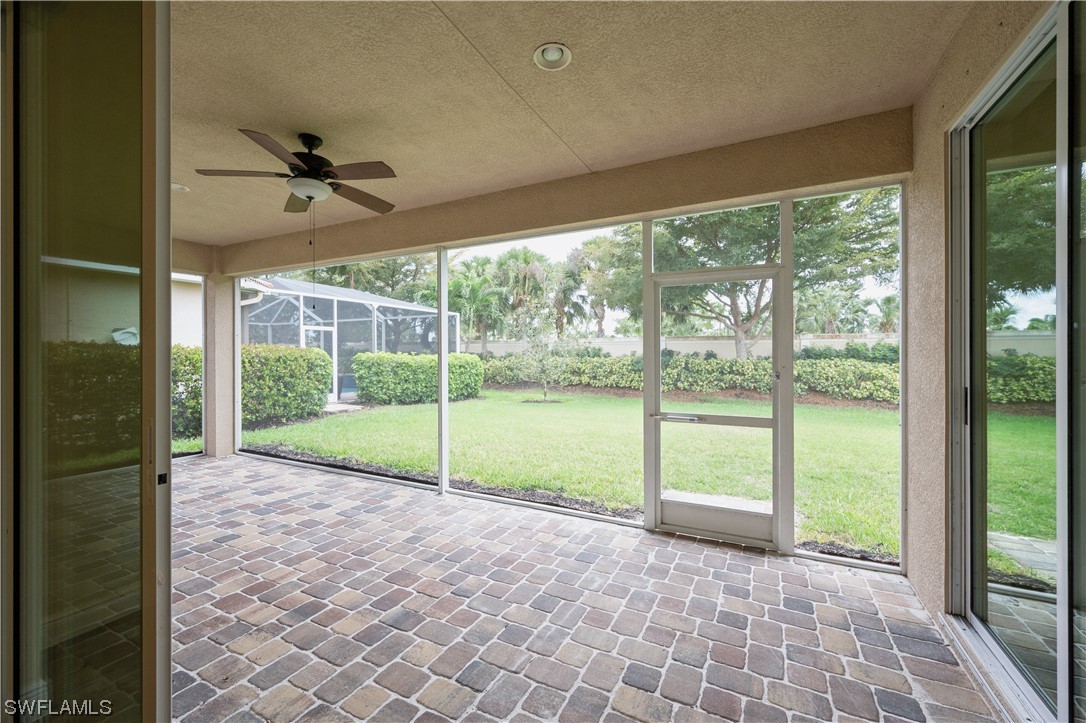 19658 Tesoro Way Estero, FL 33967 - Photo 23 of 25 a view of a room with porch and a patio