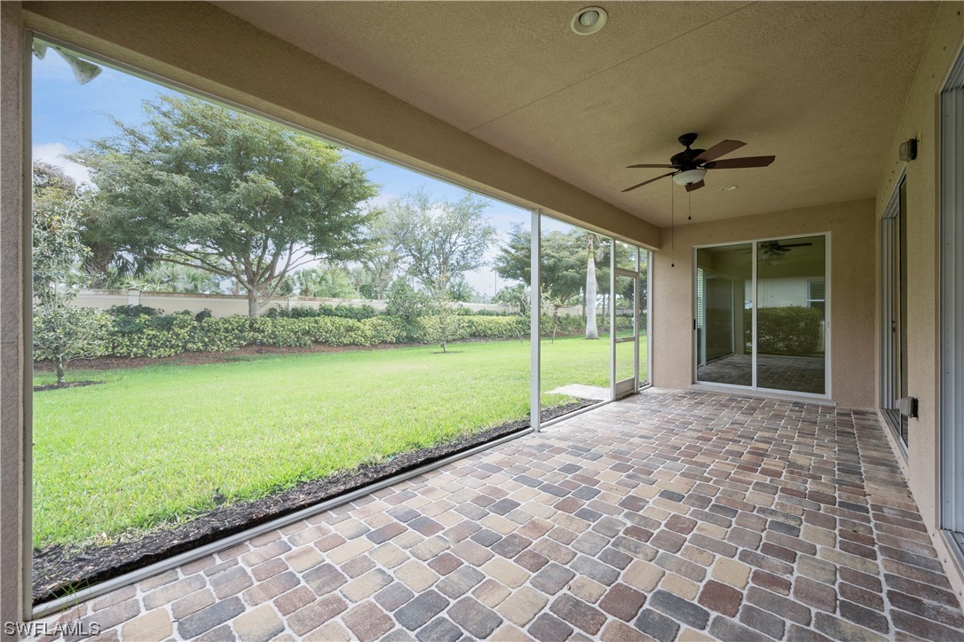 19658 Tesoro Way Estero, FL 33967 - Photo 24 of 25 a view of a room with porch and wooden floor