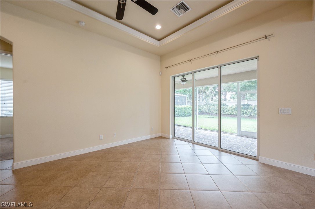 19658 Tesoro Way Estero, FL 33967 - Photo 7 of 25 a view of an empty room and window