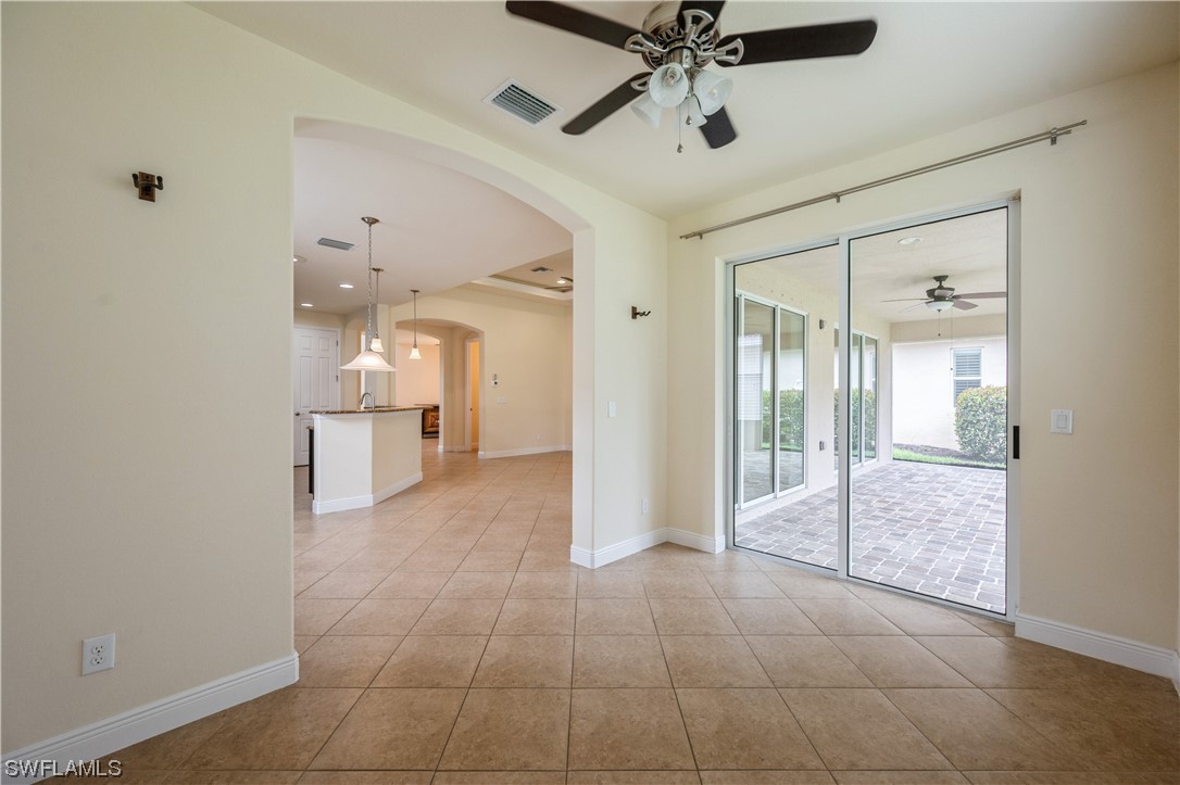 19658 Tesoro Way Estero, FL 33967 - Photo 10 of 25 a view of an empty room and a windows