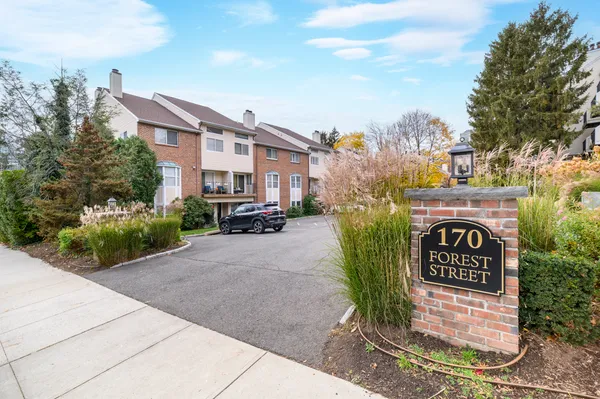 a view of street with parked cars