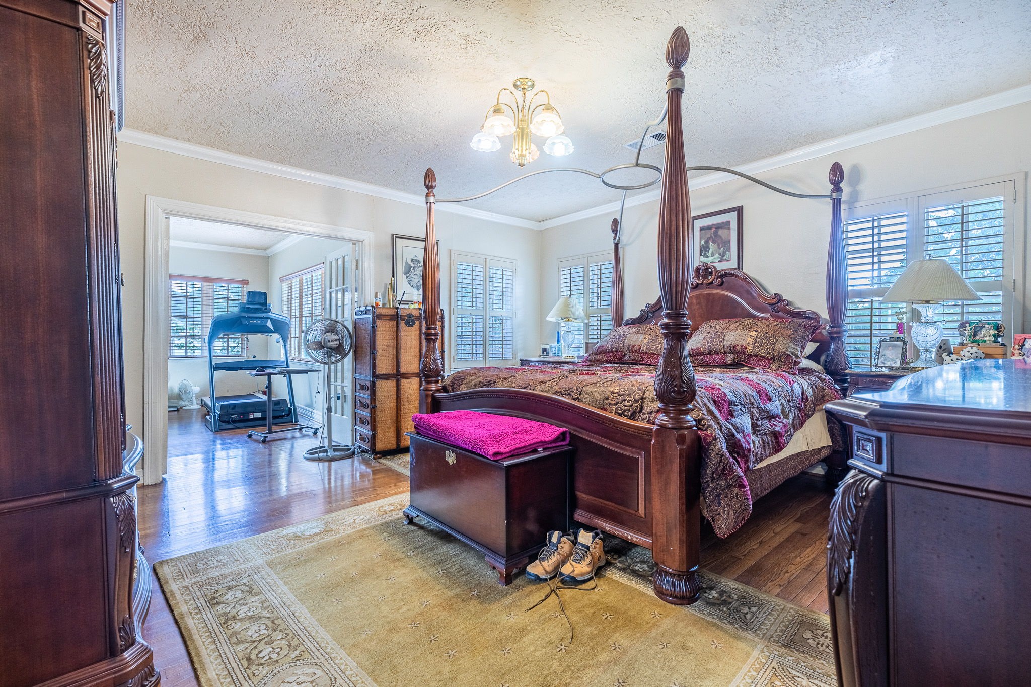 3620 South MacGregor Way Houston, TX 77021 - Photo 14 of 21 a bedroom with a bed and wooden floor
