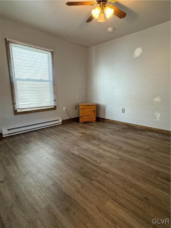 588 Mauch Chunk Road Palmerton, PA 18071 - Photo 18 of 32 an empty room with wooden floor and windows