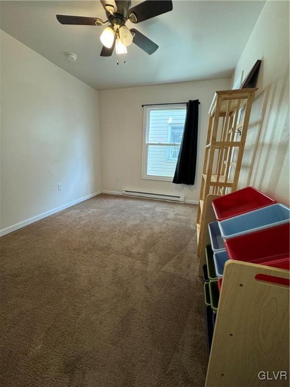 588 Mauch Chunk Road Palmerton, PA 18071 - Photo 20 of 32 a view of an empty room with window and chandelier fan
