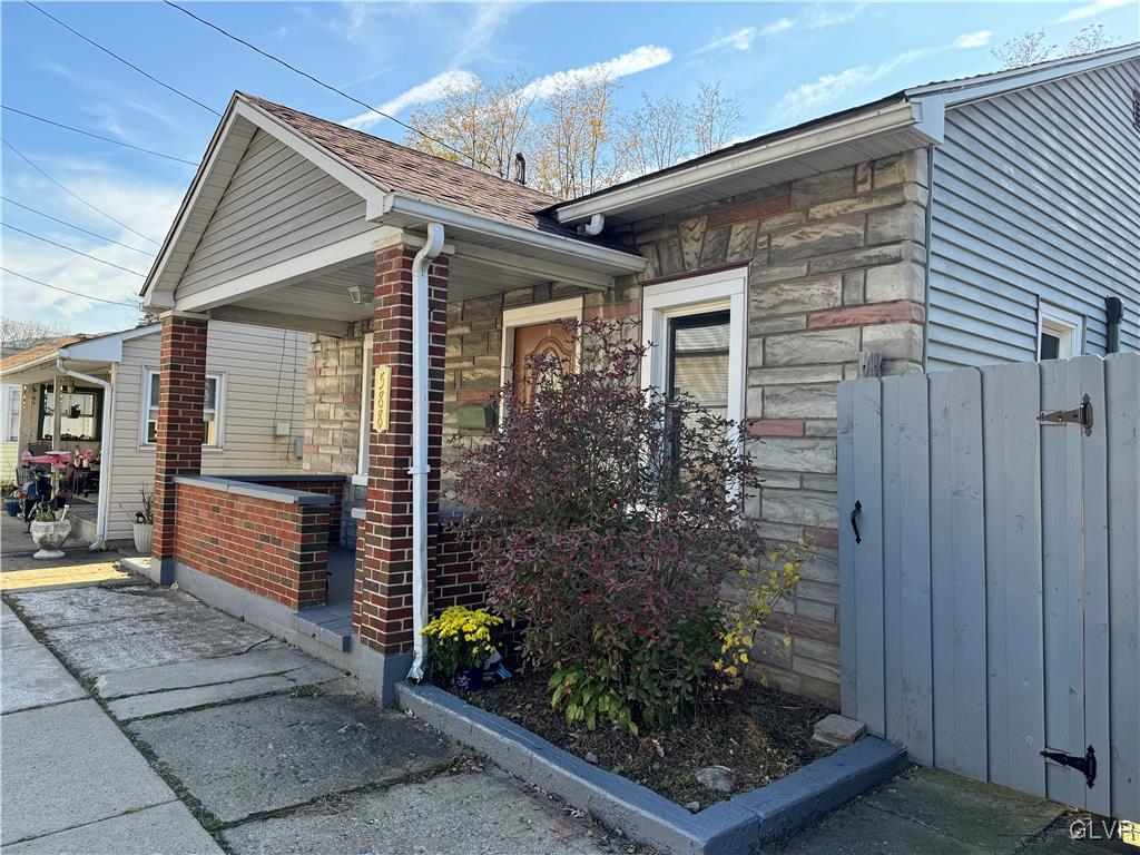 588 Mauch Chunk Road Palmerton, PA 18071 - Photo 2 of 32 a front view of a house with garden