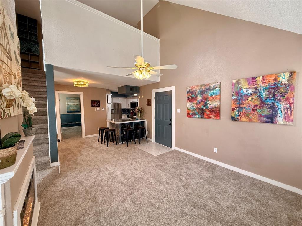 9807 Walnut Street, Unit D205 Dallas, TX 75243 - Photo 6 of 20 a view of livingroom with furniture and chandelier