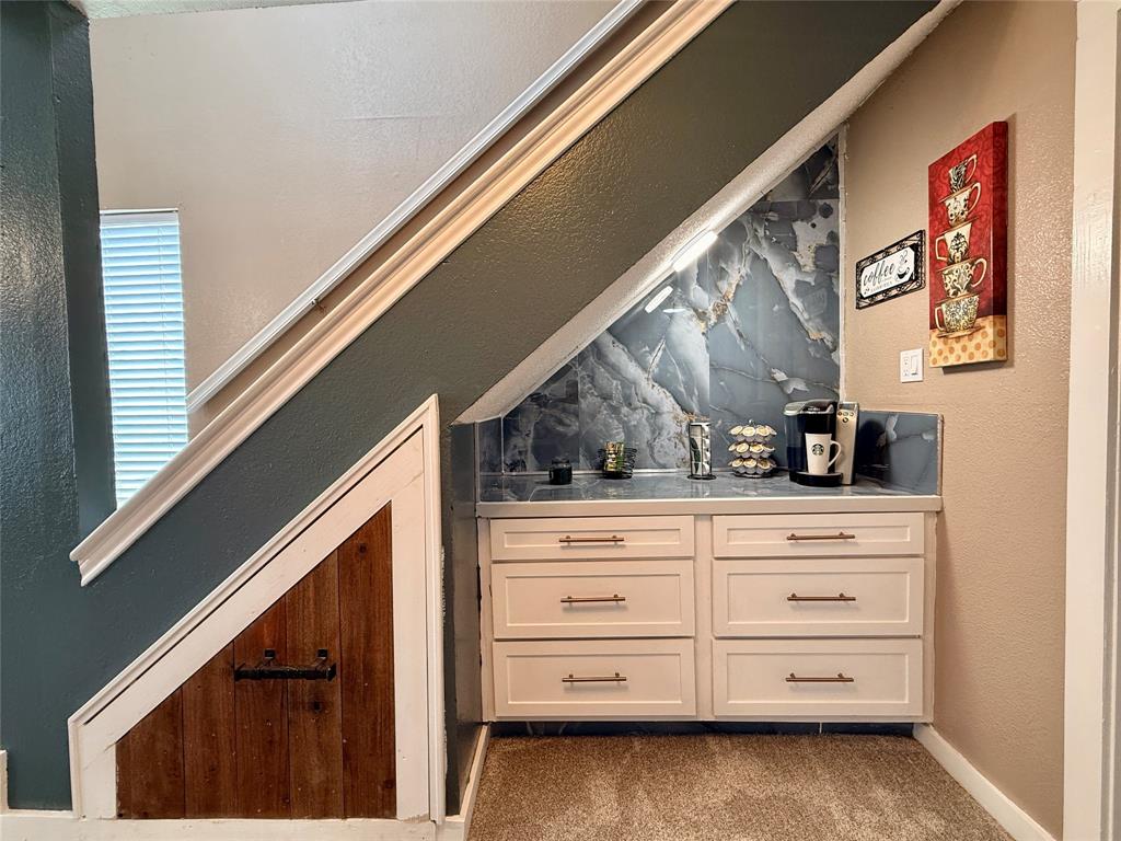 9807 Walnut Street, Unit D205 Dallas, TX 75243 - Photo 8 of 20 a view of a dresser