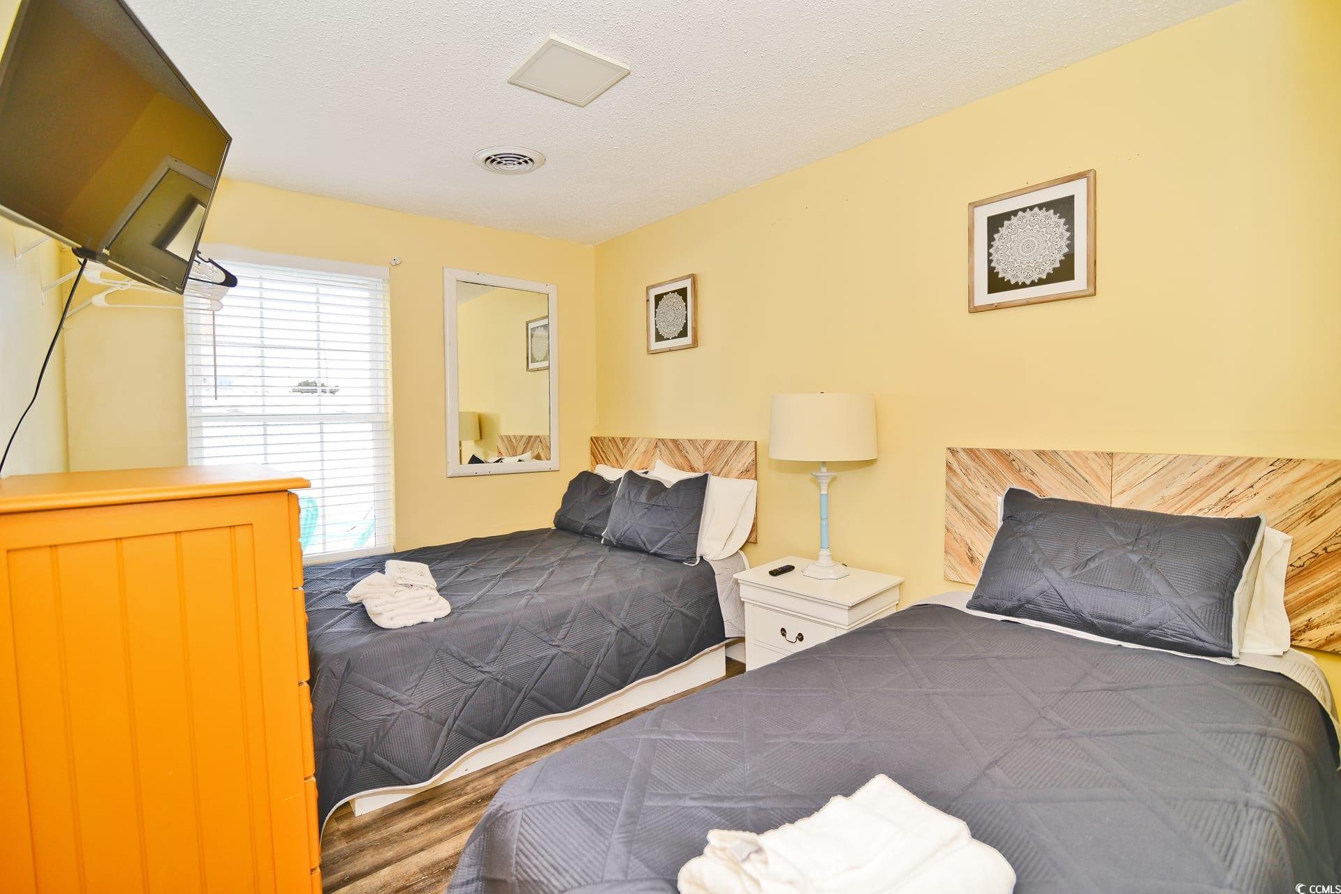 219 27th Avenue North North Myrtle Beach, SC 29582 - Photo 17 of 34 Bedroom featuring visible vents