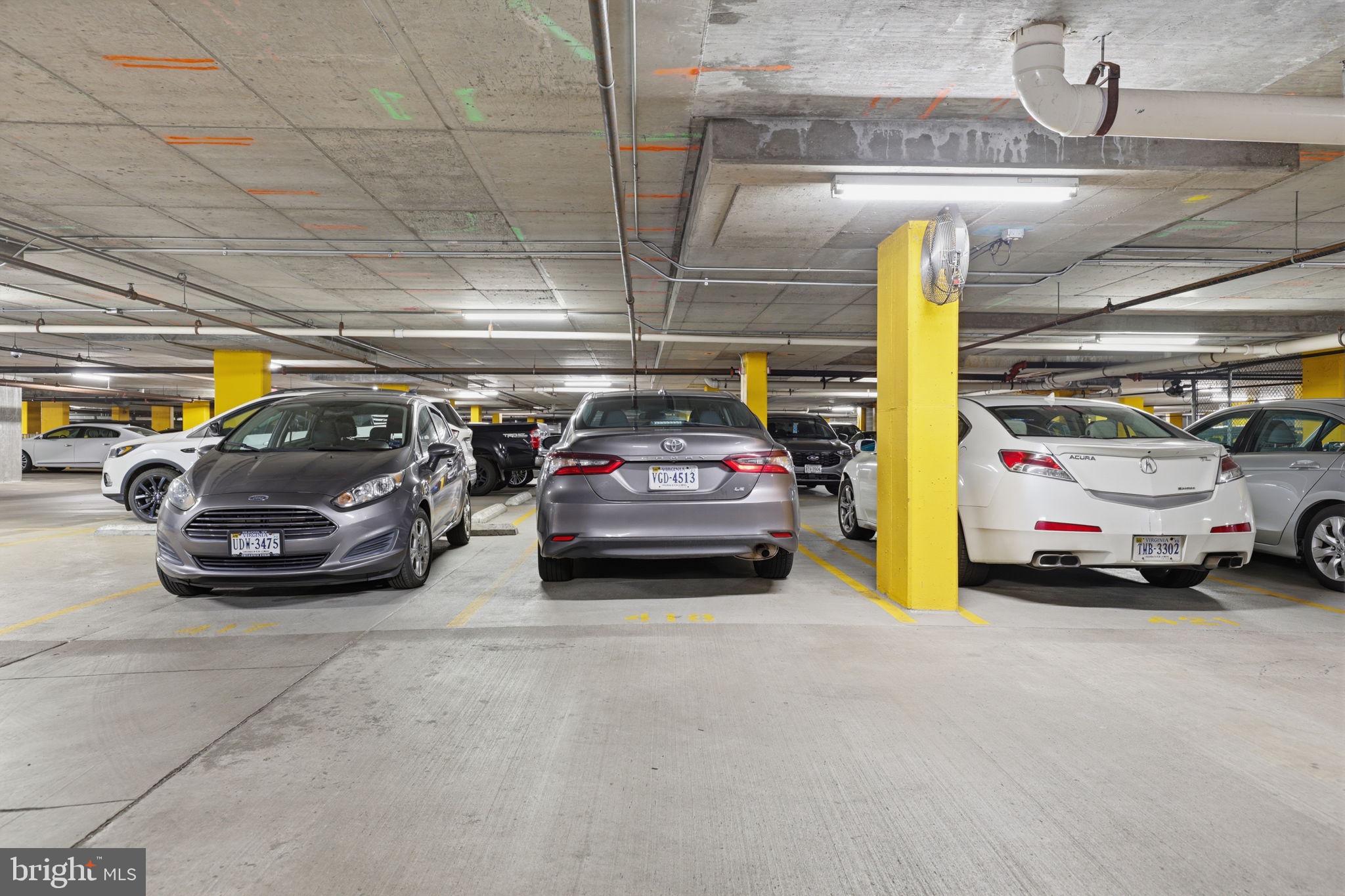 11800 Sunset Hills Road, Unit 218 Reston, VA 20190 - Photo 38 of 38 a view of parking garage with cars parked